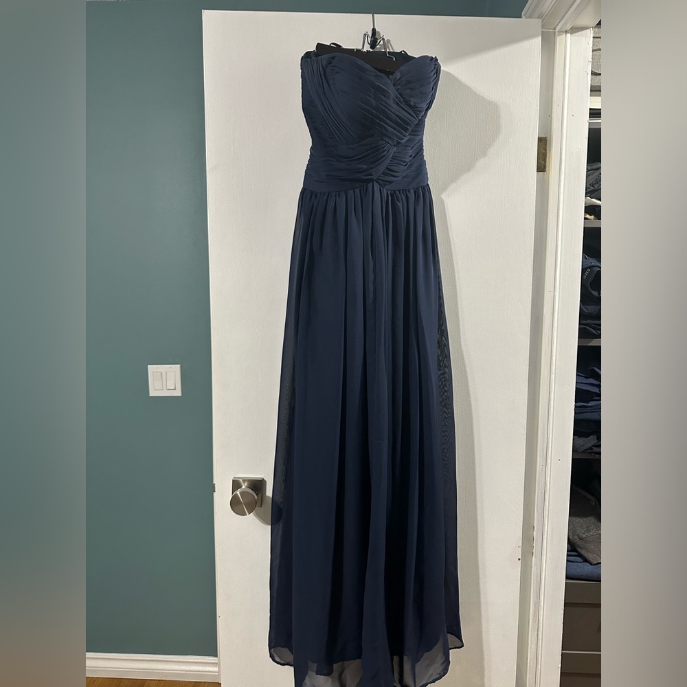 Navy blue classic floor length gown. Strapless with sweetheart neckline. Size 2